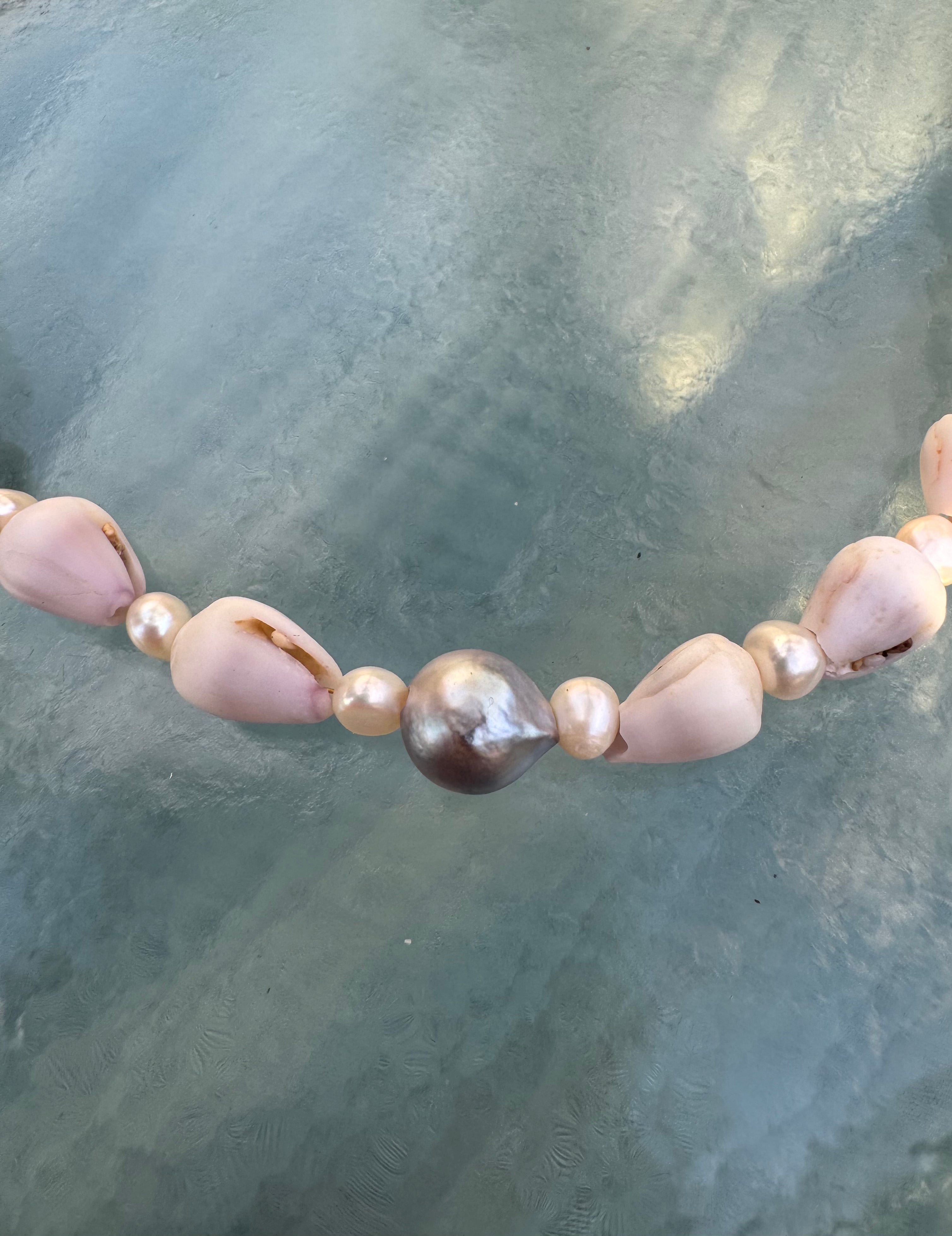Full Lavendar Cone shell lei with Pearls