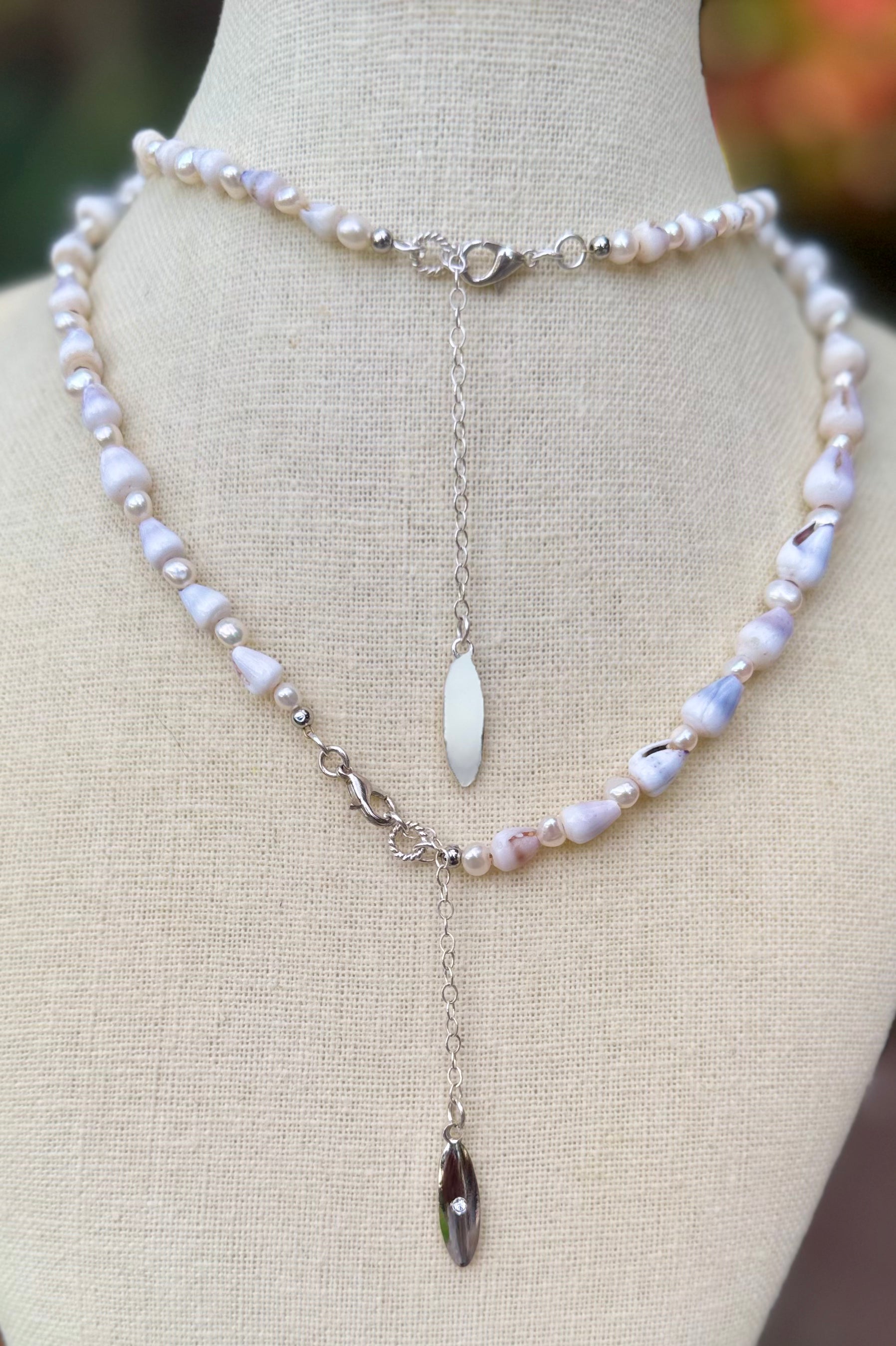 Full Lavendar Cone shell lei with Pearls