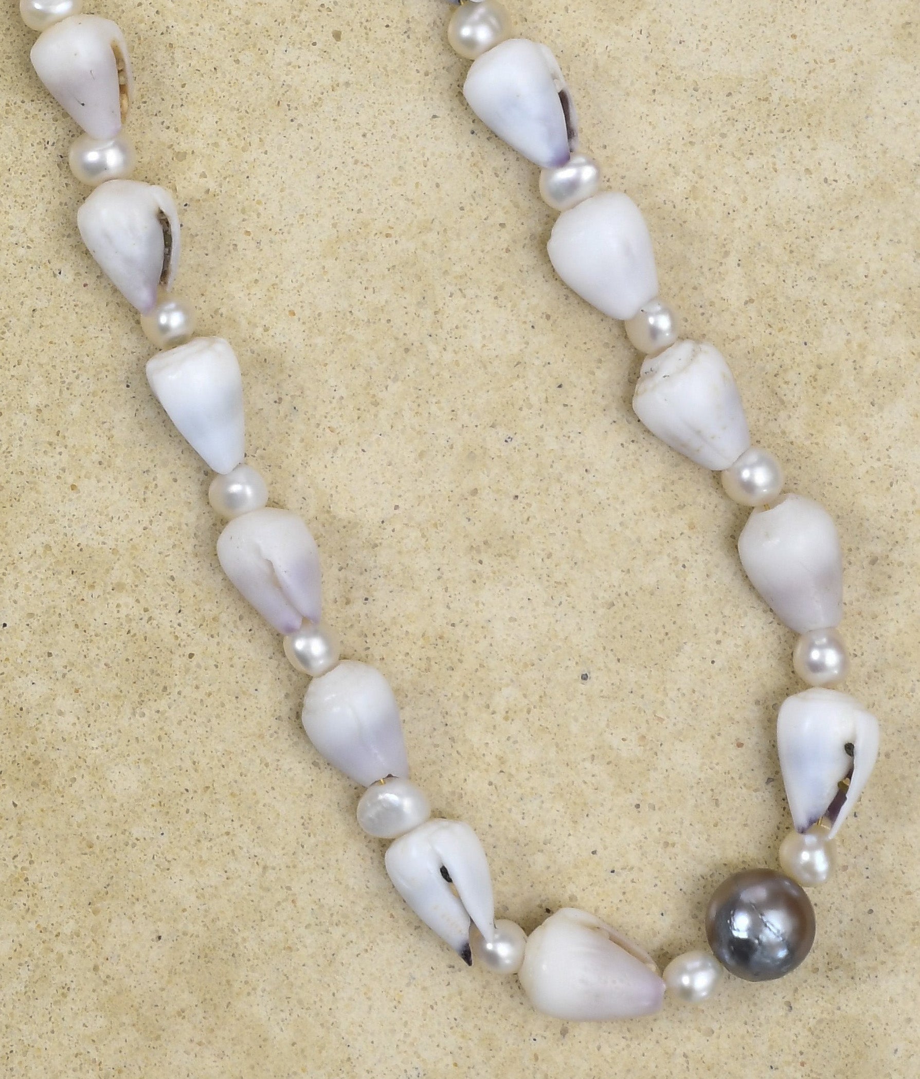 Full Lavendar Cone shell lei with Pearls