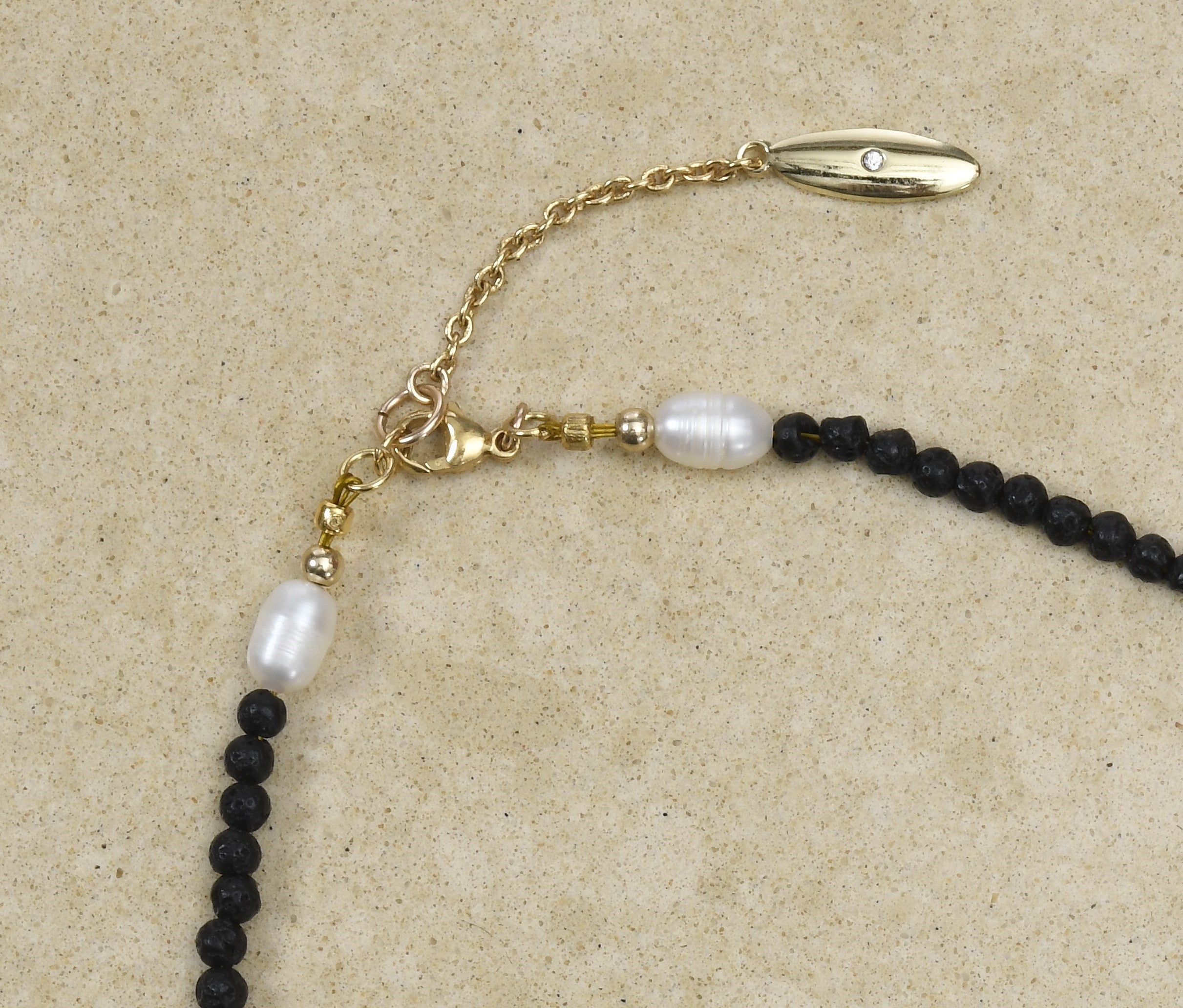 Stunning Pearl Cross with Black Lava beads