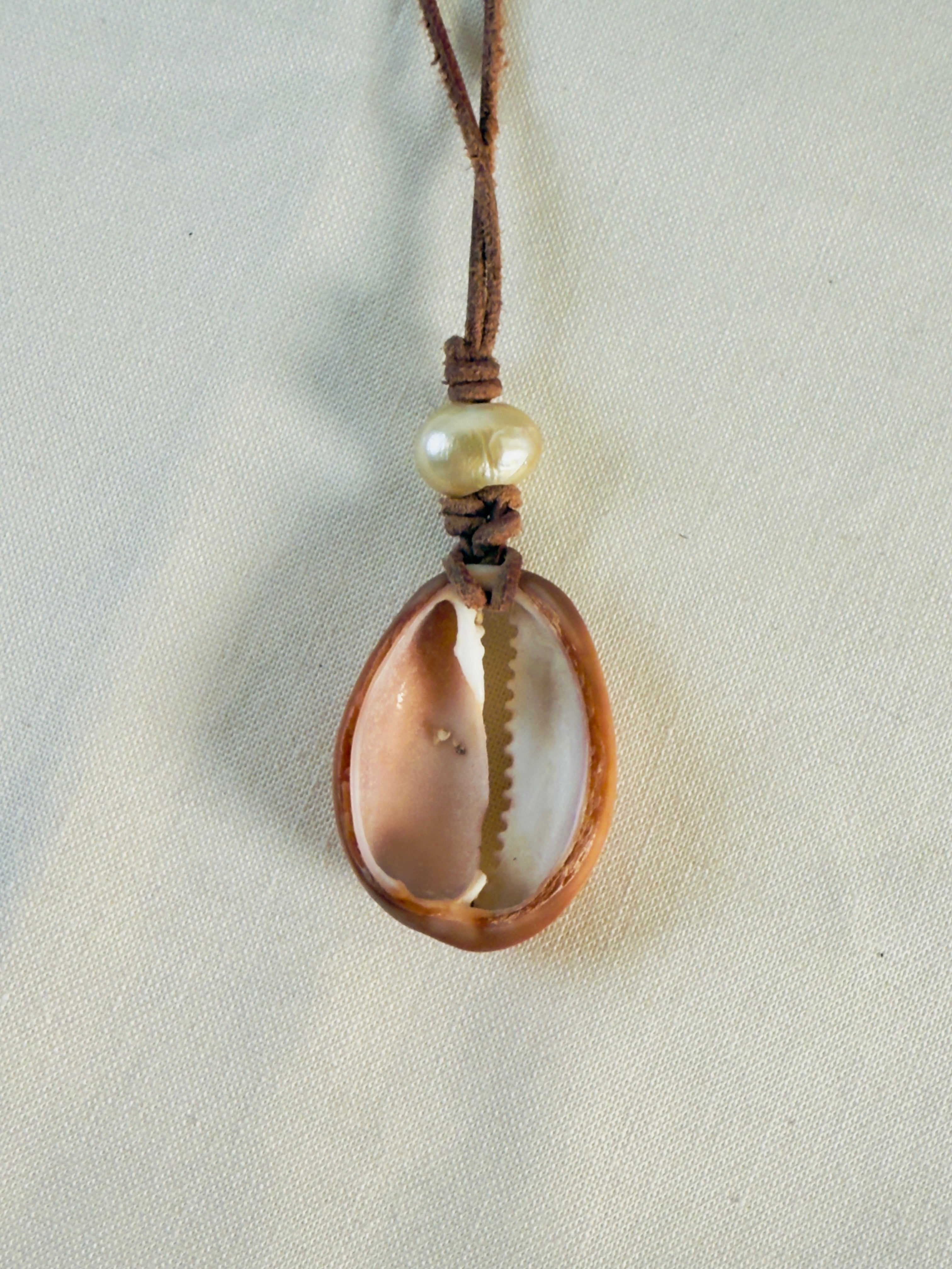 White smiling teeth and pearls